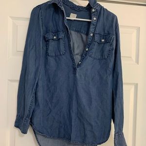 A new day shirt. Xs. Jean look to it